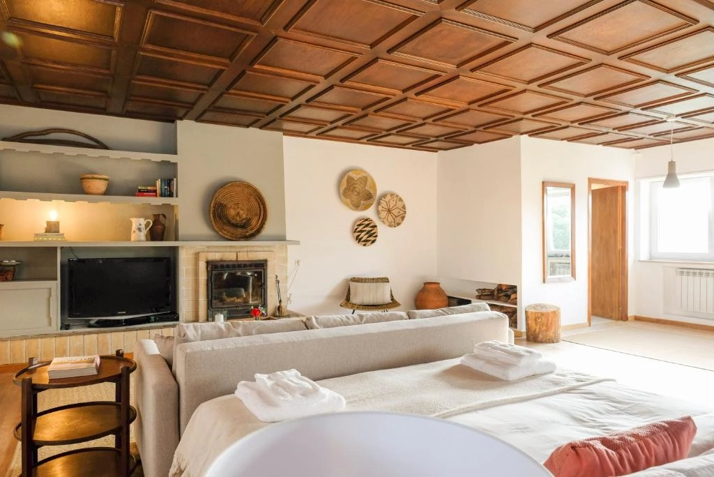 Living area with traditional wood ceiling